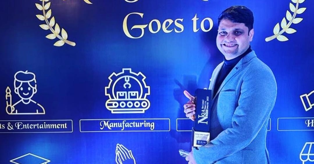 DevQAExpert team receiving Most Trusted Software Testing Company award at National Quality Awards 2023